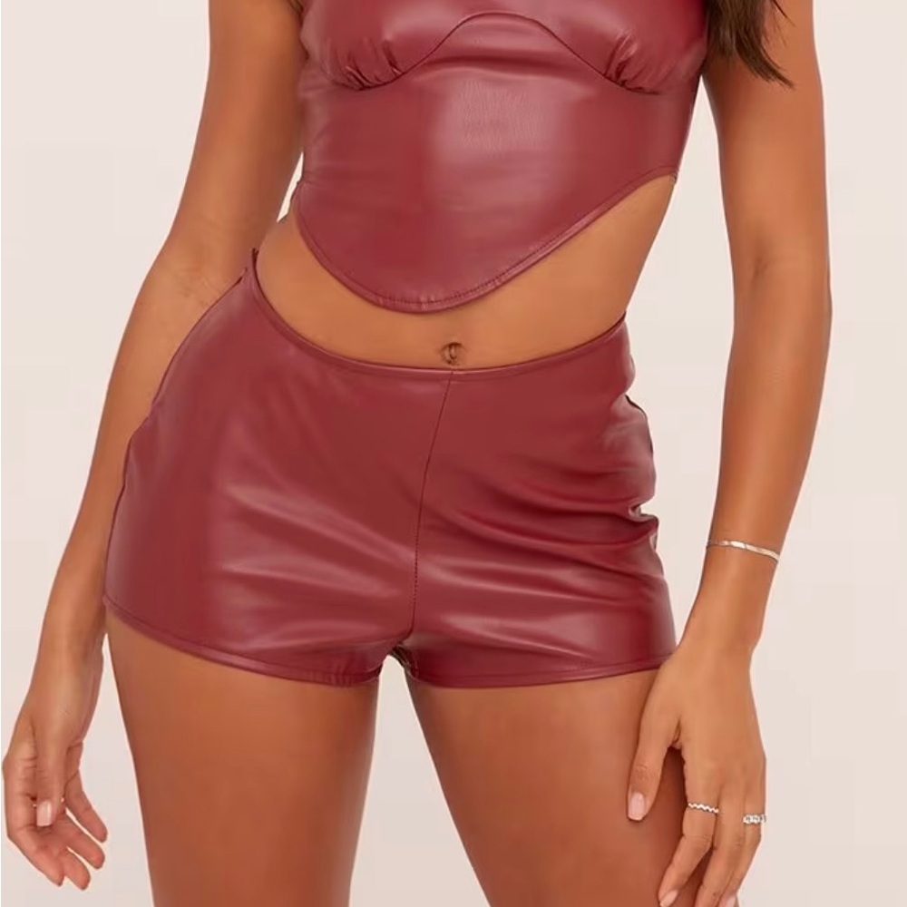 Curved Waistband Shorts In Burgundy Faux Leather